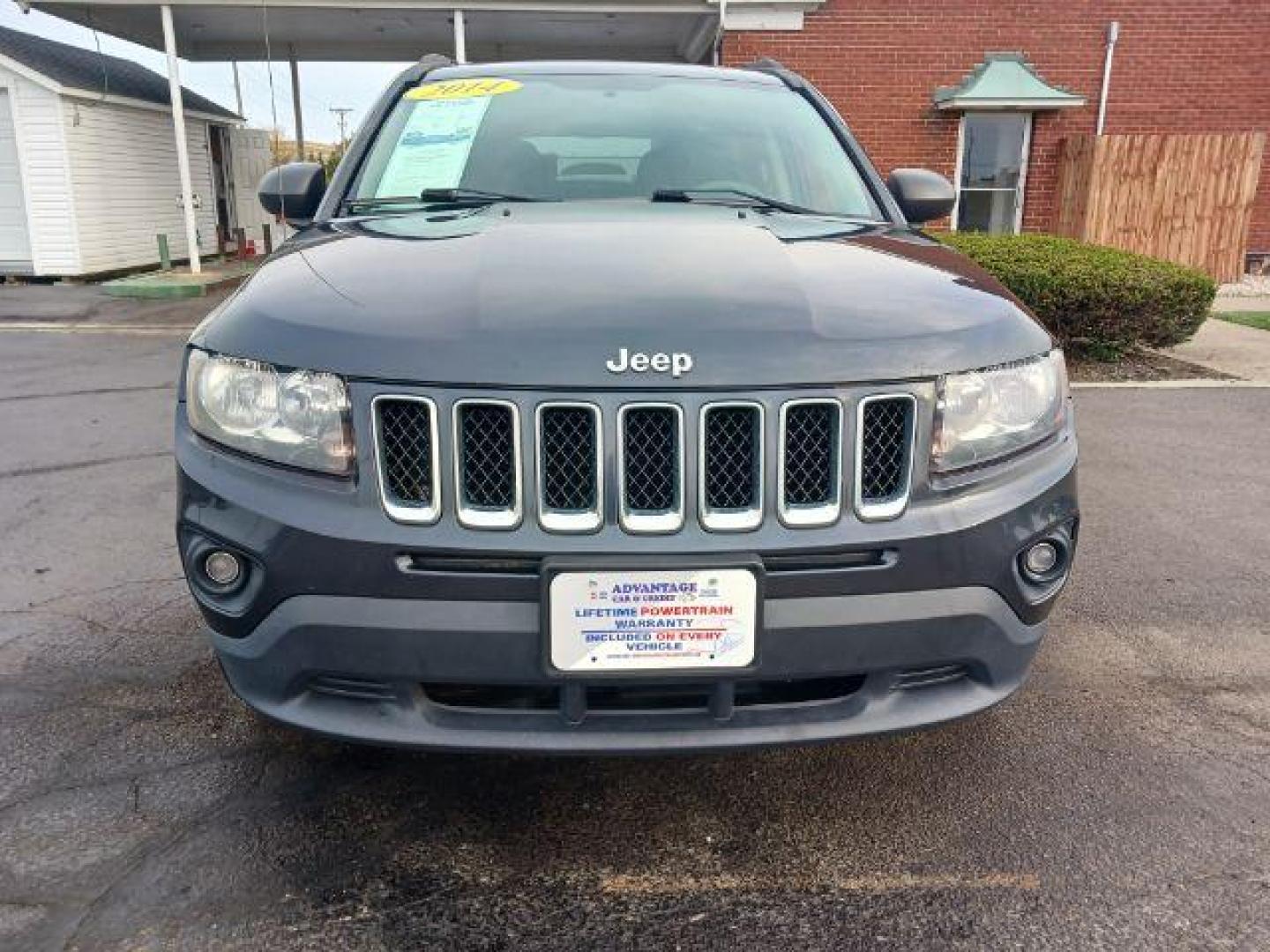 2014 Maximum Steel Metallic CC Jeep Compass Sport 4WD (1C4NJDBB5ED) with an 2.4L L4 DOHC 16V engine, located at 880 E. National Road, Vandalia, OH, 45377, (937) 908-9800, 39.892189, -84.181015 - Photo#1