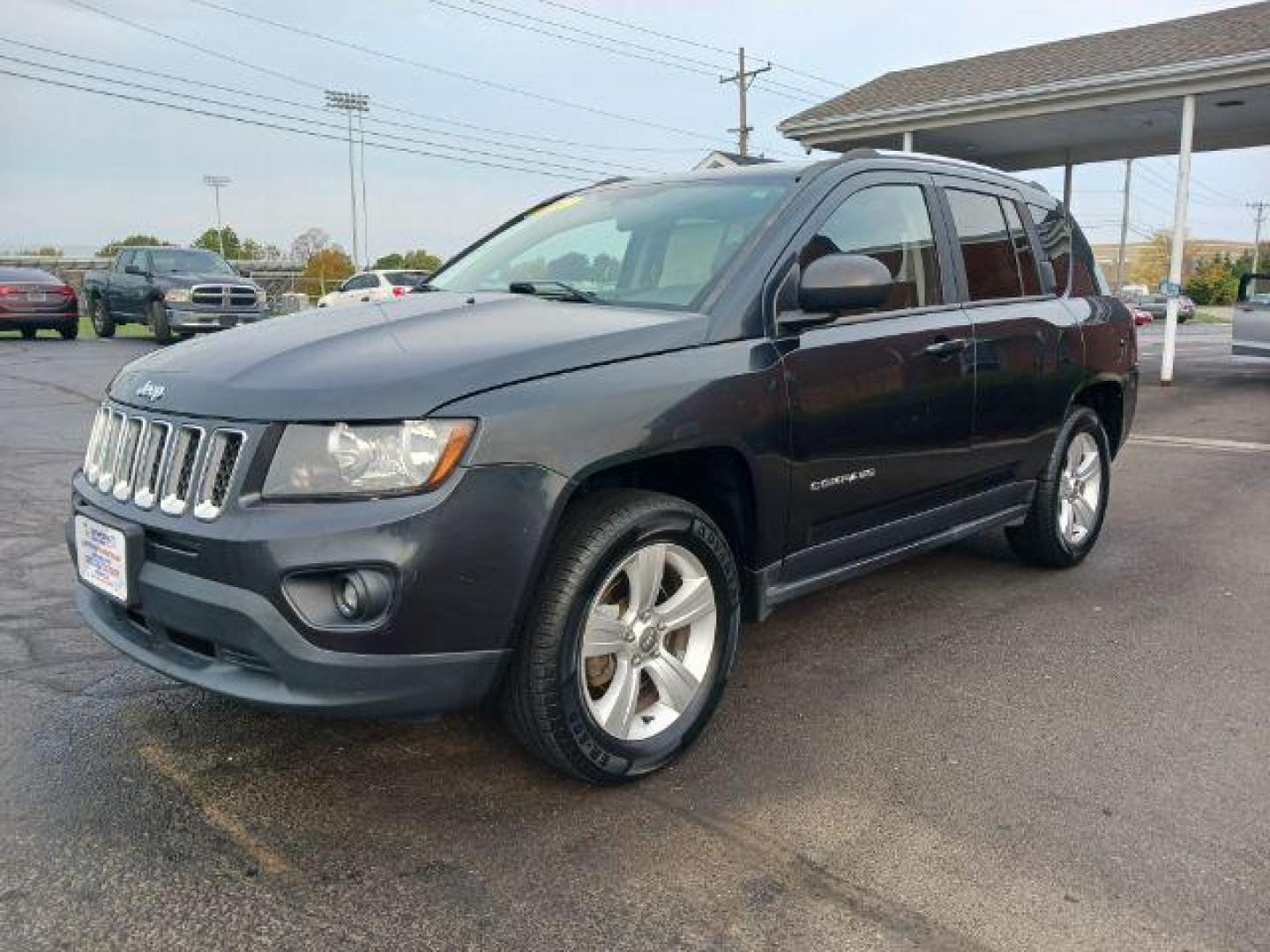 2014 Maximum Steel Metallic CC Jeep Compass Sport 4WD (1C4NJDBB5ED) with an 2.4L L4 DOHC 16V engine, located at 880 E. National Road, Vandalia, OH, 45377, (937) 908-9800, 39.892189, -84.181015 - Photo#2