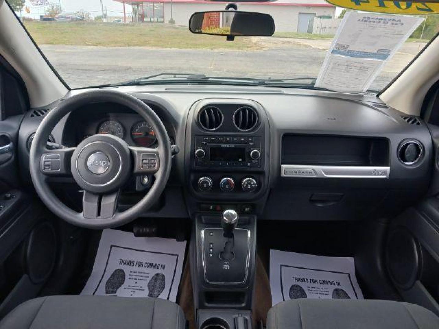 2014 Maximum Steel Metallic CC Jeep Compass Sport 4WD (1C4NJDBB5ED) with an 2.4L L4 DOHC 16V engine, located at 880 E. National Road, Vandalia, OH, 45377, (937) 908-9800, 39.892189, -84.181015 - Photo#7