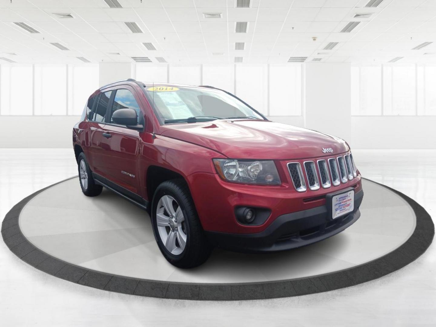 2014 Dp Cherry Red Crystal PC Jeep Compass Sport 4WD (1C4NJDBBXED) with an 2.4L L4 DOHC 16V engine, located at 1099 N County Rd 25A, OH, 45373, (937) 908-9800, 40.057079, -84.212883 - Photo#0