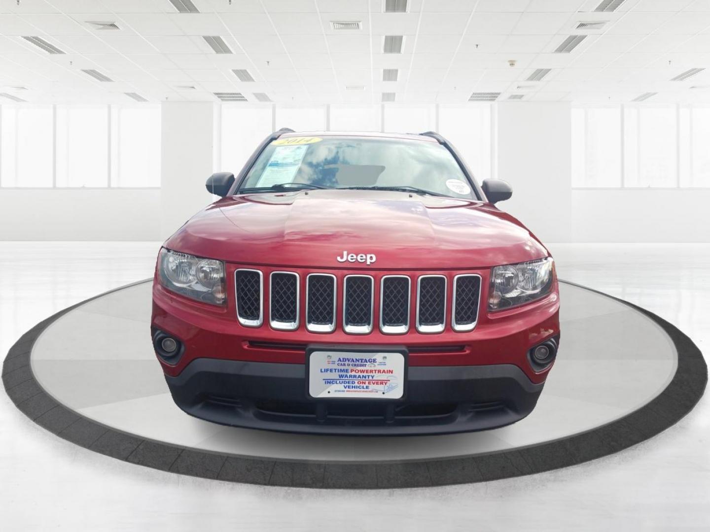 2014 Dp Cherry Red Crystal PC Jeep Compass Sport 4WD (1C4NJDBBXED) with an 2.4L L4 DOHC 16V engine, located at 1099 N County Rd 25A, OH, 45373, (937) 908-9800, 40.057079, -84.212883 - Photo#6