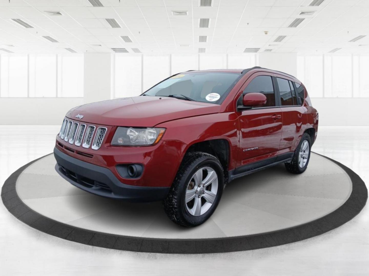 2014 Dp Cherry Red Crystal PC Jeep Compass Latitude 4WD (1C4NJDEB4ED) with an 2.4L L4 DOHC 16V engine, Continuously Variable Transmission transmission, located at 8750 N County Rd 25A, Piqua, OH, 45356, (937) 908-9800, 40.164391, -84.232513 - 2014 Jeep Compass Latitude 4WD - Photo#7