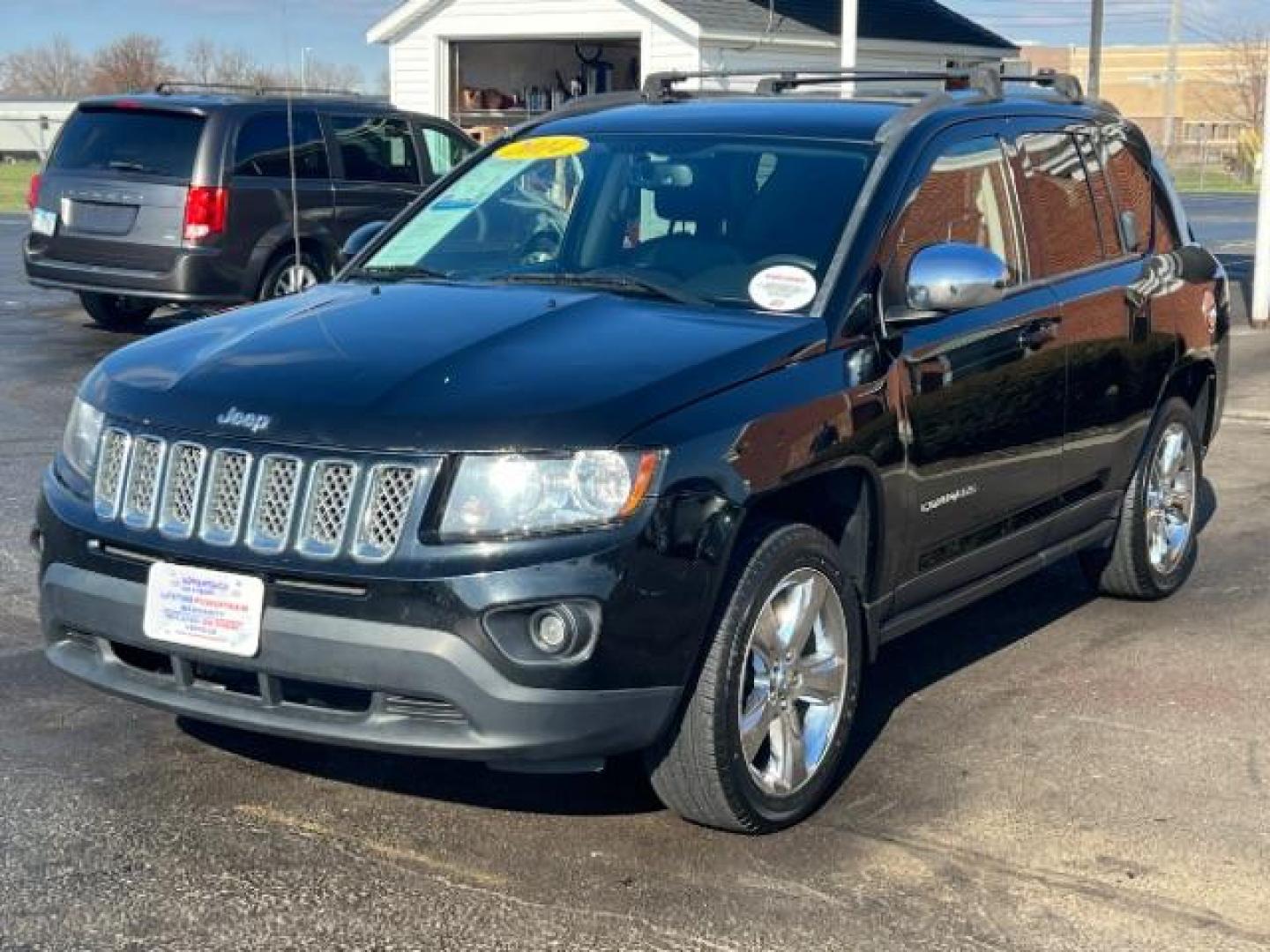 2014 Black Clearcoat Jeep Compass Latitude 4WD (1C4NJDEB5ED) with an 2.4L L4 DOHC 16V engine, Continuously Variable Transmission transmission, located at 1184 Kauffman Ave, Fairborn, OH, 45324, (937) 908-9800, 39.807365, -84.029114 - Photo#2