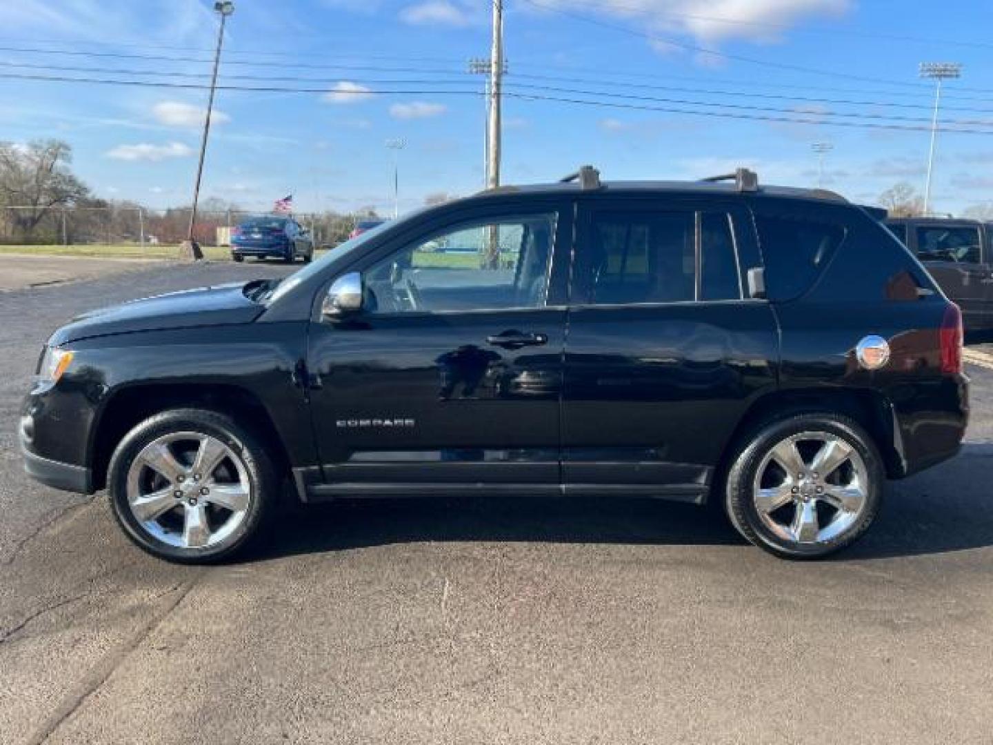 2014 Black Clearcoat Jeep Compass Latitude 4WD (1C4NJDEB5ED) with an 2.4L L4 DOHC 16V engine, Continuously Variable Transmission transmission, located at 1184 Kauffman Ave, Fairborn, OH, 45324, (937) 908-9800, 39.807365, -84.029114 - Photo#3