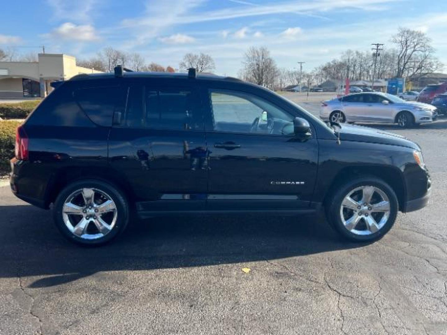 2014 Black Clearcoat Jeep Compass Latitude 4WD (1C4NJDEB5ED) with an 2.4L L4 DOHC 16V engine, Continuously Variable Transmission transmission, located at 1184 Kauffman Ave, Fairborn, OH, 45324, (937) 908-9800, 39.807365, -84.029114 - Photo#5