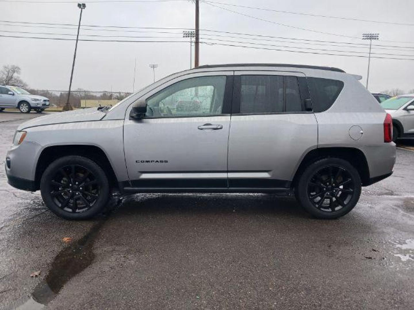 2014 Bright Silver Metallic CC Jeep Compass Sport FWD (1C4NJCBAXED) with an 2.0L L4 DOHC 16V engine, located at 1184 Kauffman Ave, Fairborn, OH, 45324, (937) 908-9800, 39.807365, -84.029114 - Photo#3