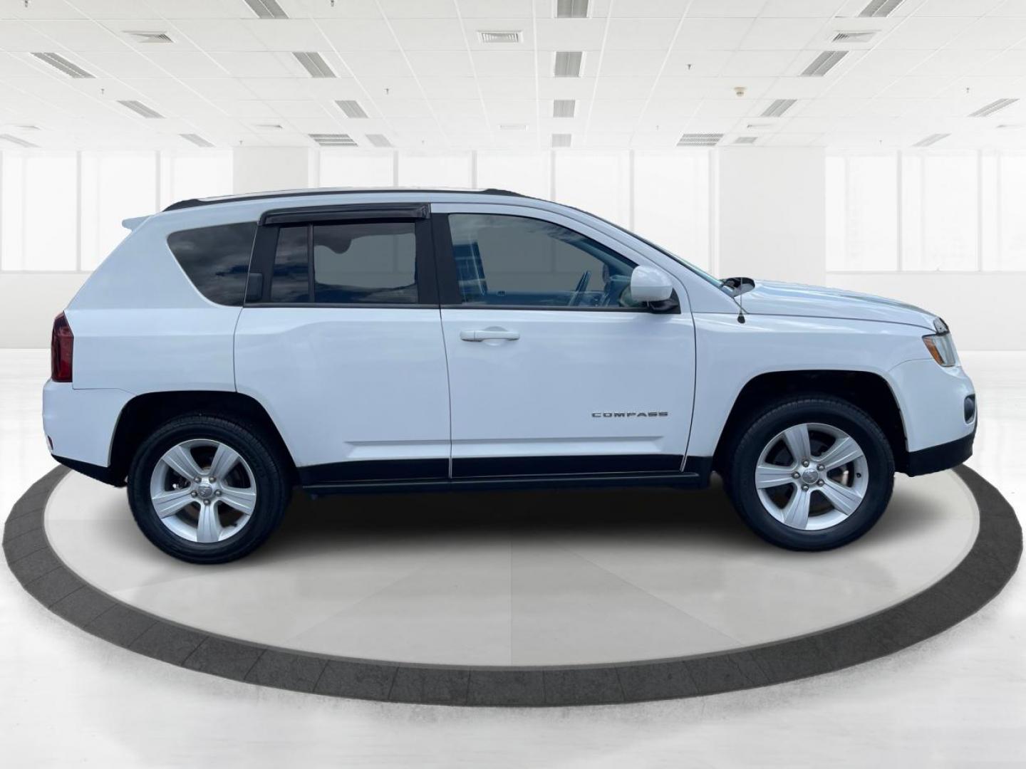 2014 Bright White Clearcoat Jeep Compass Latitude 4WD (1C4NJDEB8ED) with an 2.4L L4 DOHC 16V engine, Continuously Variable Transmission transmission, located at 1184 Kauffman Ave, Fairborn, OH, 45324, (937) 908-9800, 39.807365, -84.029114 - Photo#1