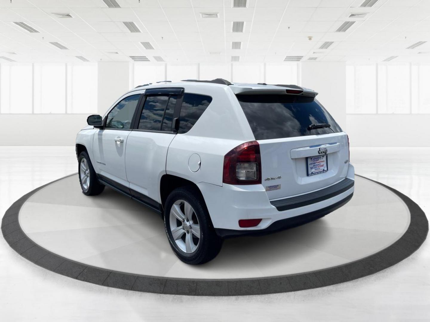 2014 Bright White Clearcoat Jeep Compass Latitude 4WD (1C4NJDEB8ED) with an 2.4L L4 DOHC 16V engine, Continuously Variable Transmission transmission, located at 1184 Kauffman Ave, Fairborn, OH, 45324, (937) 908-9800, 39.807365, -84.029114 - Photo#4