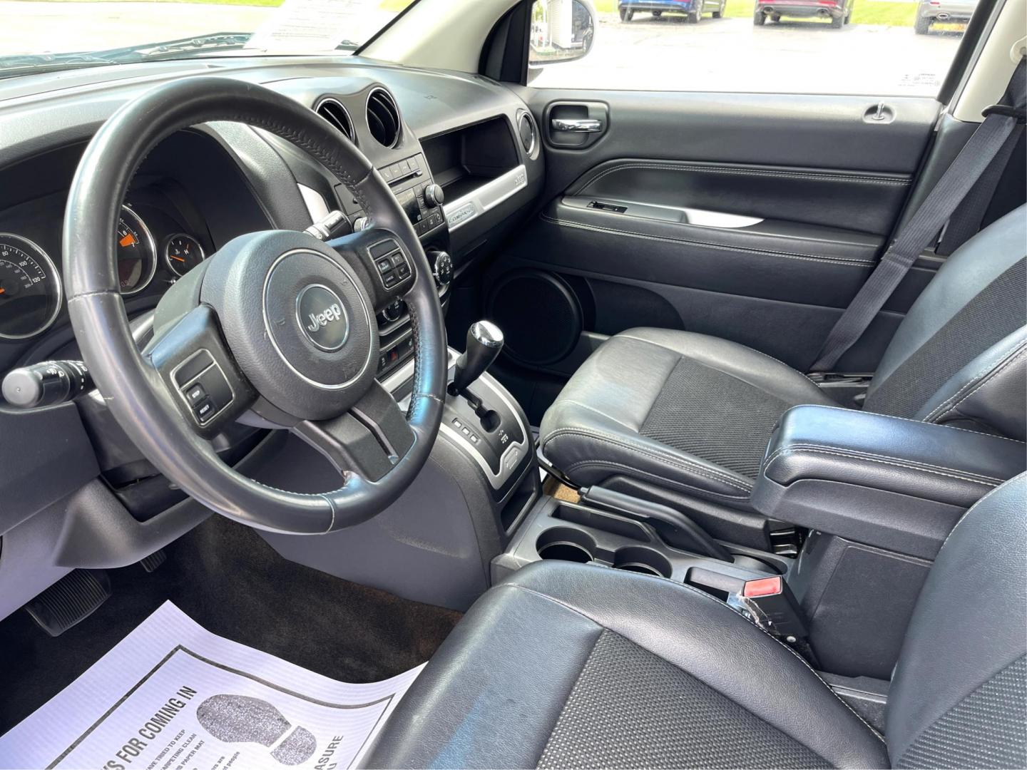 2014 Bright White Clearcoat Jeep Compass Latitude 4WD (1C4NJDEB8ED) with an 2.4L L4 DOHC 16V engine, Continuously Variable Transmission transmission, located at 1184 Kauffman Ave, Fairborn, OH, 45324, (937) 908-9800, 39.807365, -84.029114 - Photo#8