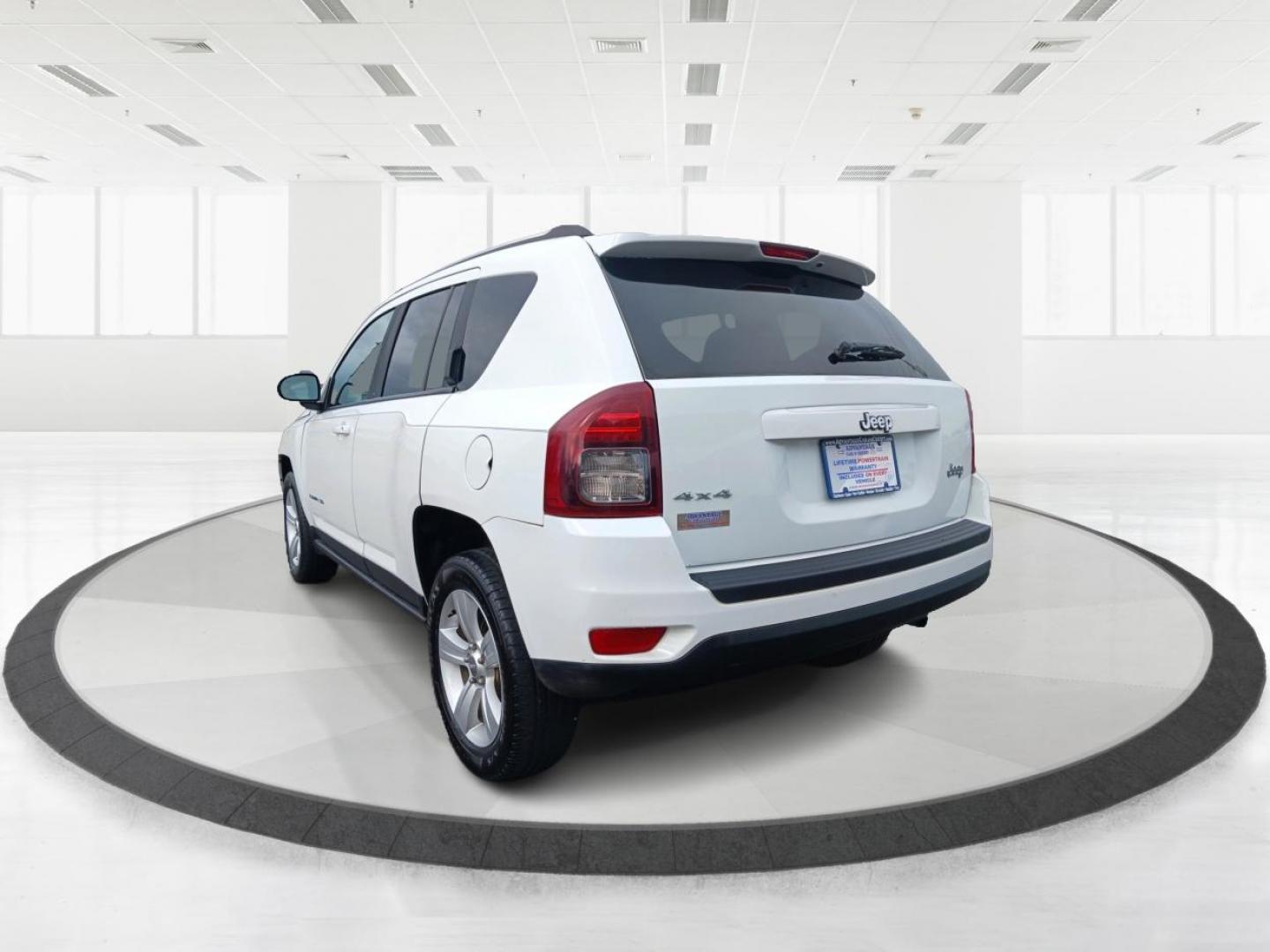 2014 Winter Chill Pearlcoat Jeep Compass (1C4NJDBB1ED) with an 2.4L L4 DOHC 16V engine, located at 4508 South Dixie Dr, Moraine, OH, 45439, (937) 908-9800, 39.690136, -84.216438 - Photo#2