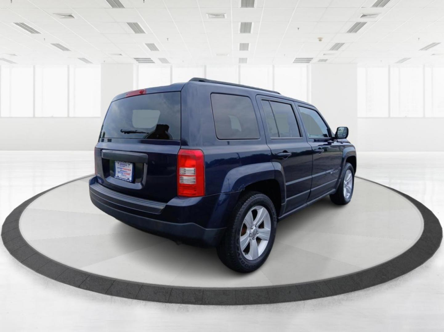 2014 True Blue Pearlcoat Jeep Patriot (1C4NJRBB3ED) with an 2.4L L4 DOHC 16V engine, located at 880 E. National Road, Vandalia, OH, 45377, (937) 908-9800, 39.892189, -84.181015 - Photo#2