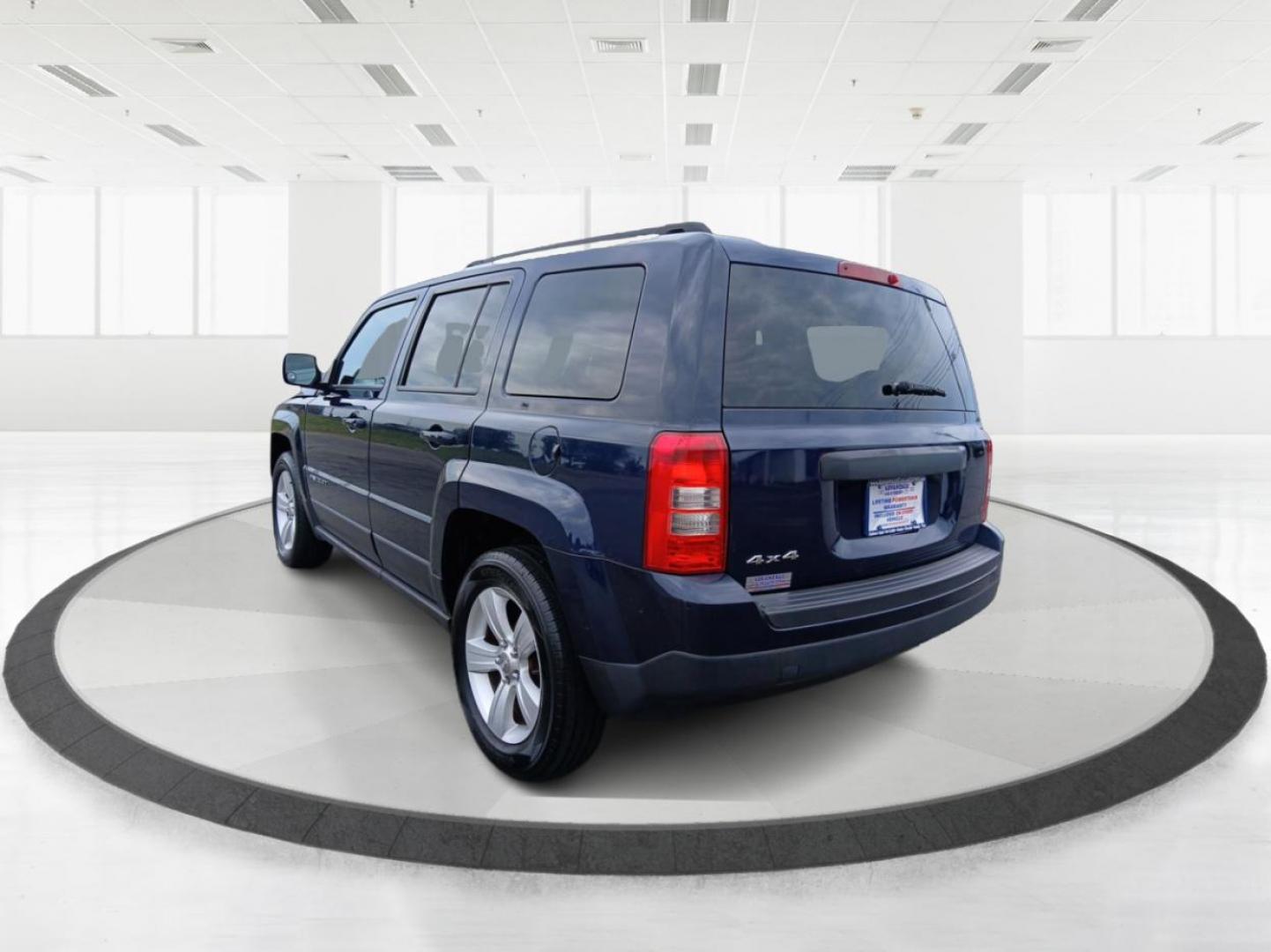 2014 True Blue Pearlcoat Jeep Patriot (1C4NJRBB3ED) with an 2.4L L4 DOHC 16V engine, located at 880 E. National Road, Vandalia, OH, 45377, (937) 908-9800, 39.892189, -84.181015 - Photo#4