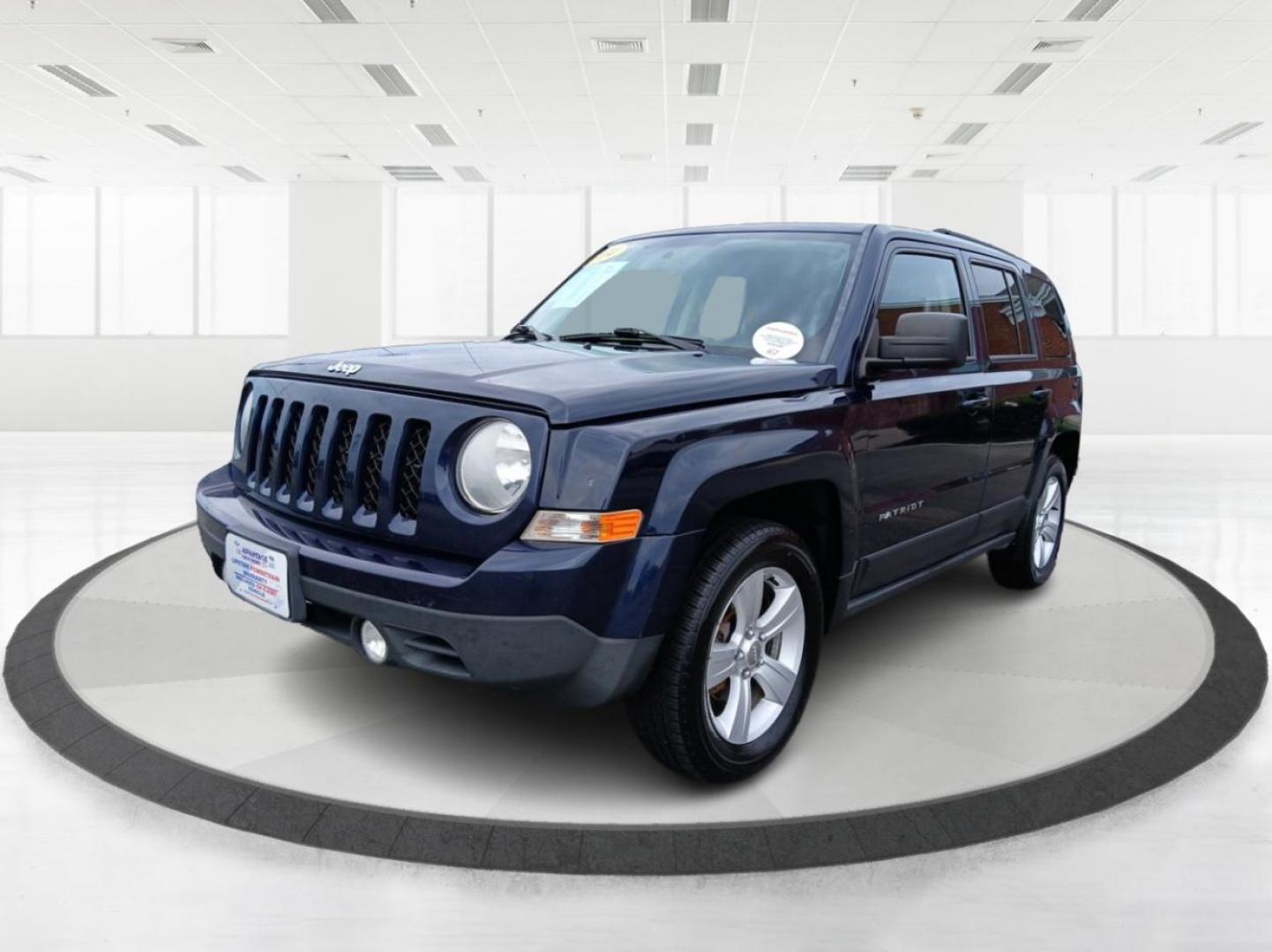 2014 True Blue Pearlcoat Jeep Patriot (1C4NJRBB3ED) with an 2.4L L4 DOHC 16V engine, located at 880 E. National Road, Vandalia, OH, 45377, (937) 908-9800, 39.892189, -84.181015 - Photo#7