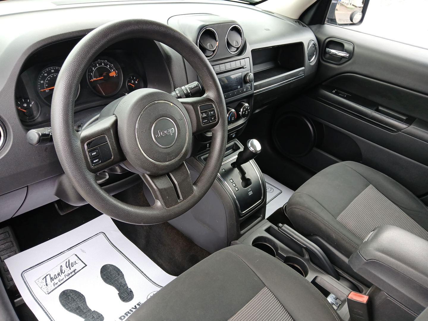 2014 True Blue Pearlcoat Jeep Patriot (1C4NJRBB3ED) with an 2.4L L4 DOHC 16V engine, located at 880 E. National Road, Vandalia, OH, 45377, (937) 908-9800, 39.892189, -84.181015 - Photo#8