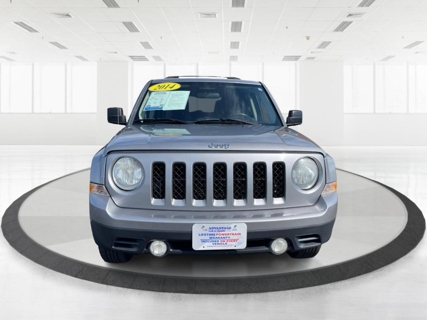 2014 Bright Silver Metallic CC Jeep Patriot Latitude 4WD (1C4NJRFB2ED) with an 2.4L L4 DOHC 16V engine, located at 1099 N County Rd 25A, OH, 45373, (937) 908-9800, 40.057079, -84.212883 - Photo#6