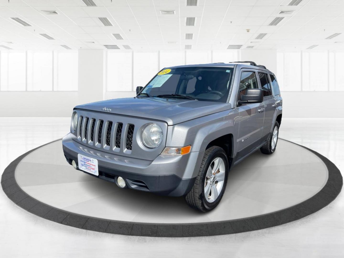 2014 Bright Silver Metallic CC Jeep Patriot Latitude 4WD (1C4NJRFB2ED) with an 2.4L L4 DOHC 16V engine, located at 1099 N County Rd 25A, OH, 45373, (937) 908-9800, 40.057079, -84.212883 - Photo#7