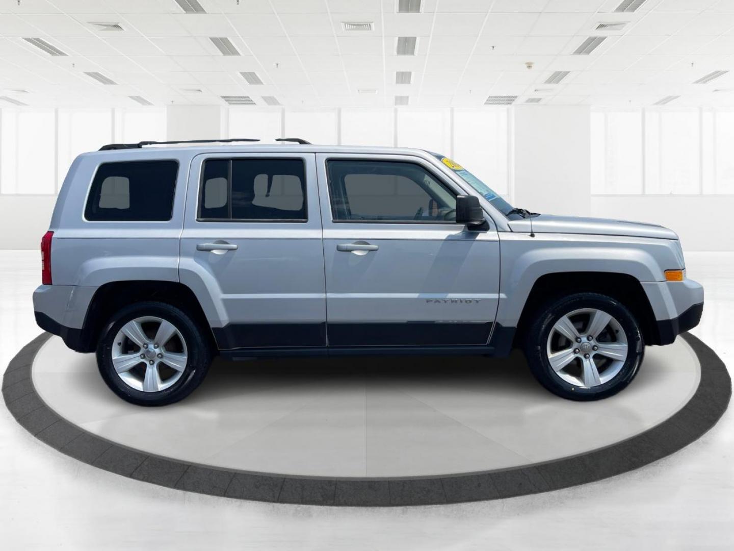 2014 Bright Silver Metallic CC Jeep Patriot (1C4NJPFA5ED) with an 2.0L L4 DOHC 16V engine, located at 1099 N County Rd 25A, OH, 45373, (937) 908-9800, 40.057079, -84.212883 - Photo#1