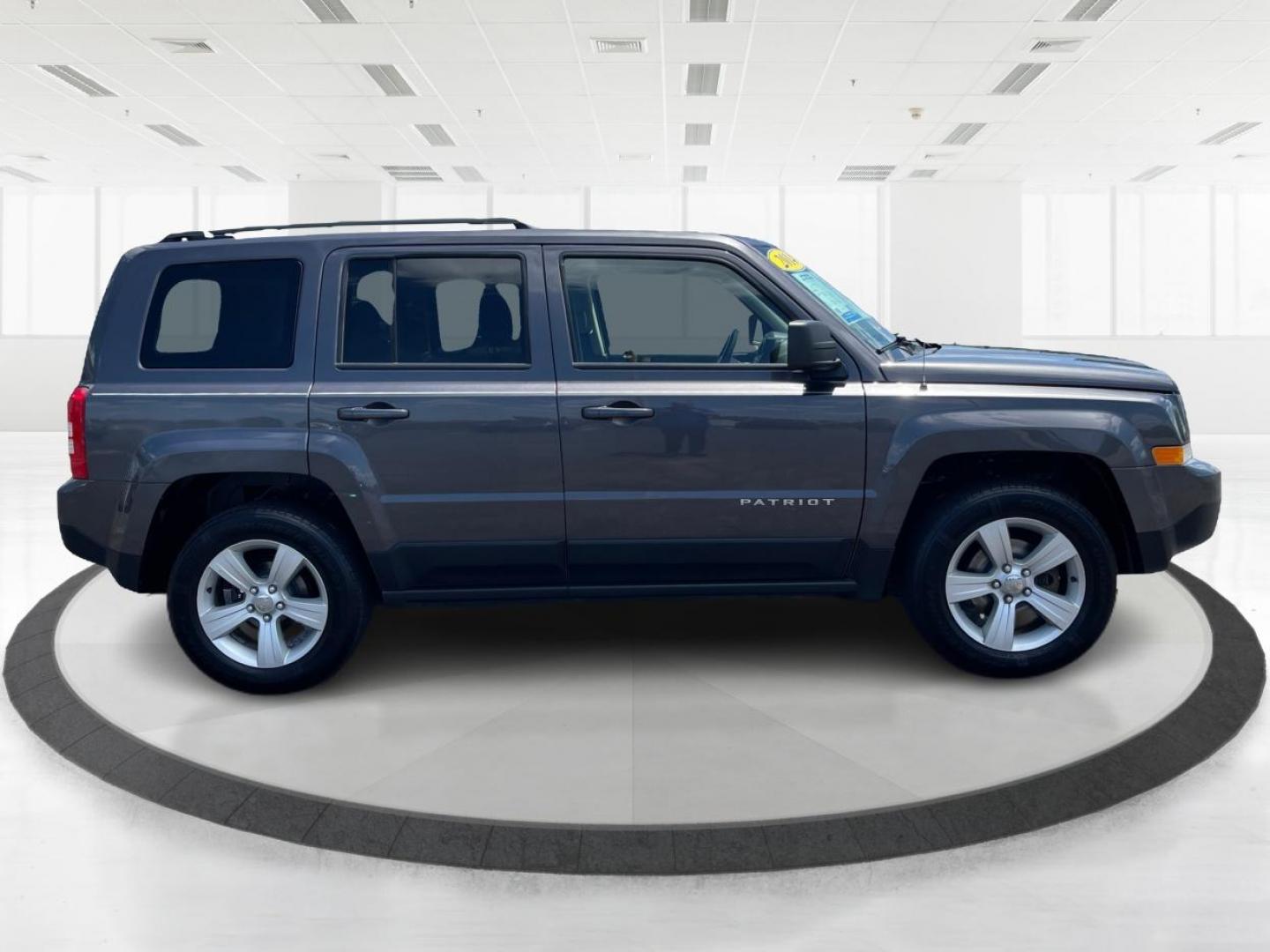 2014 Granite Crystal Met CC Jeep Patriot Sport 4WD (1C4NJRBB8ED) with an 2.4L L4 DOHC 16V engine, located at 401 Woodman Dr, Riverside, OH, 45431, (937) 908-9800, 39.763779, -84.122063 - Photo#1