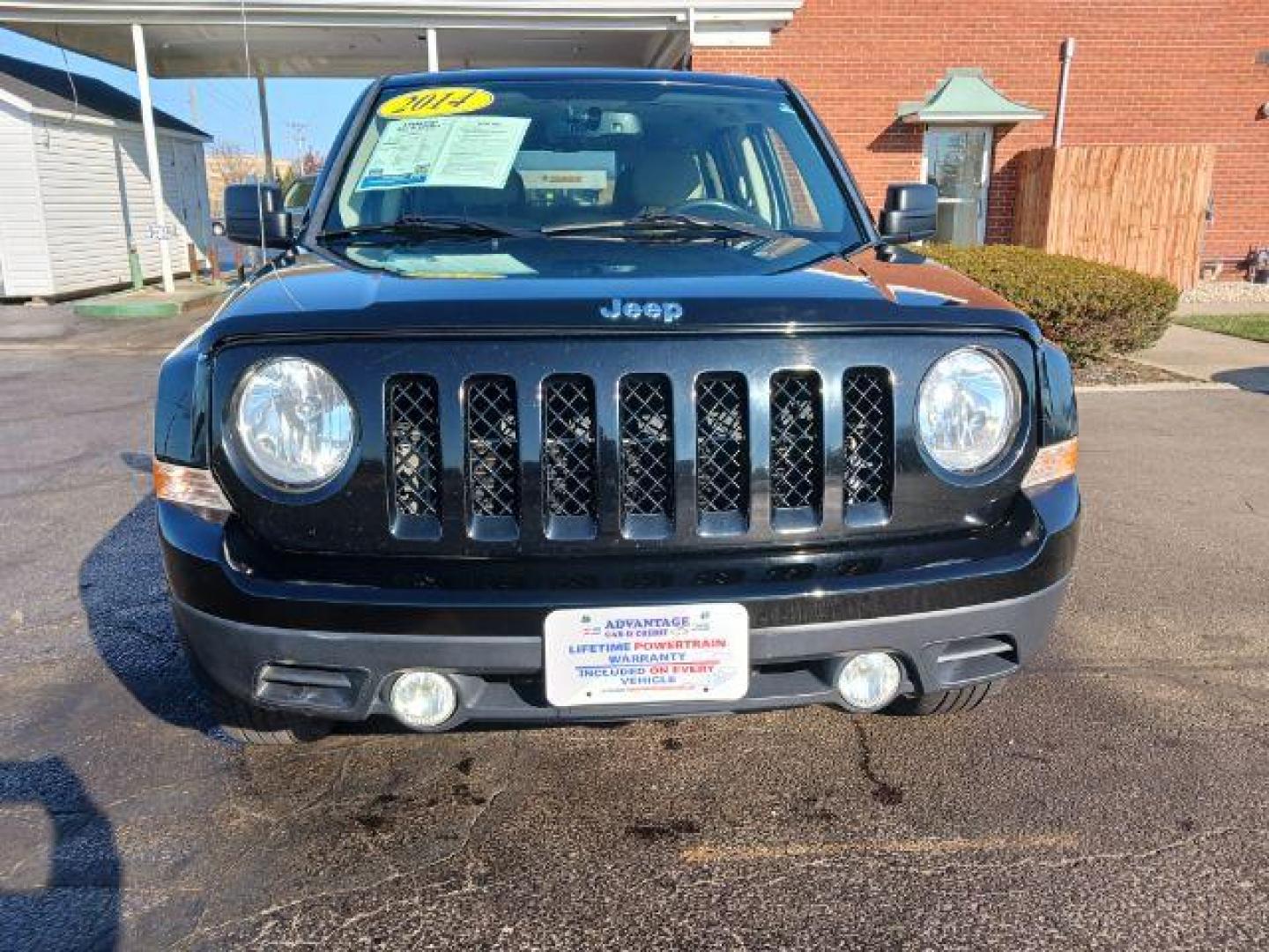 2014 Black Clearcoat Jeep Patriot Latitude 4WD (1C4NJRFB8ED) with an 2.4L L4 DOHC 16V engine, located at 401 Woodman Dr, Riverside, OH, 45431, (937) 908-9800, 39.763779, -84.122063 - Photo#1