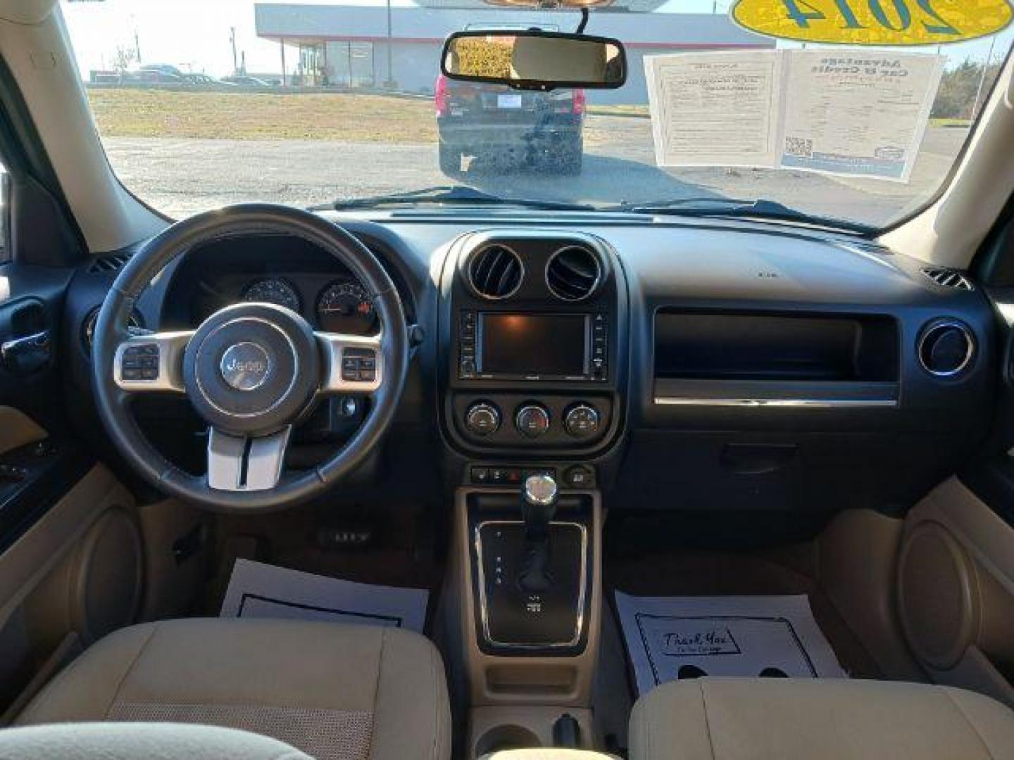 2014 Black Clearcoat Jeep Patriot Latitude 4WD (1C4NJRFB8ED) with an 2.4L L4 DOHC 16V engine, located at 401 Woodman Dr, Riverside, OH, 45431, (937) 908-9800, 39.763779, -84.122063 - Photo#7