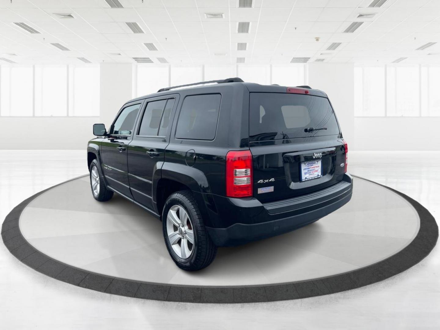 2014 Black Clearcoat Jeep Patriot Latitude 4WD (1C4NJRFB1ED) with an 2.4L L4 DOHC 16V engine, located at 4508 South Dixie Dr, Moraine, OH, 45439, (937) 908-9800, 39.690136, -84.216438 - Photo#4