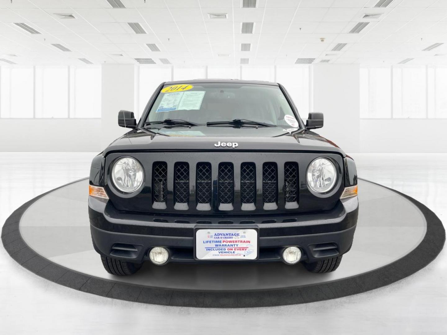 2014 Black Clearcoat Jeep Patriot Latitude 4WD (1C4NJRFB1ED) with an 2.4L L4 DOHC 16V engine, located at 4508 South Dixie Dr, Moraine, OH, 45439, (937) 908-9800, 39.690136, -84.216438 - Photo#6