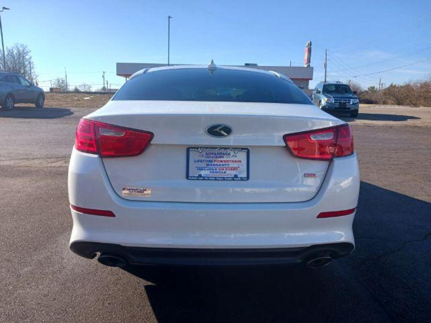 2014 Snow White Pearl Kia Optima LX (5XXGM4A71EG) with an 2.4L L4 DOHC 16V engine, 6-Speed Automatic transmission, located at 1184 Kauffman Ave, Fairborn, OH, 45324, (937) 908-9800, 39.807365, -84.029114 - Photo#5