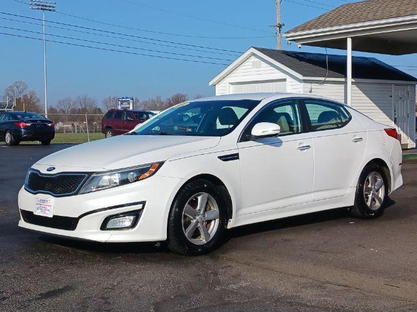 2014 Snow White Pearl Kia Optima LX (5XXGM4A75EG) with an 2.4L L4 DOHC 16V engine, 6-Speed Automatic transmission, located at 880 E. National Road, Vandalia, OH, 45377, (937) 908-9800, 39.892189, -84.181015 - Photo#2