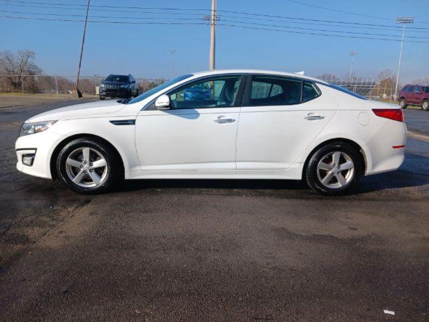 2014 Snow White Pearl Kia Optima LX (5XXGM4A75EG) with an 2.4L L4 DOHC 16V engine, 6-Speed Automatic transmission, located at 880 E. National Road, Vandalia, OH, 45377, (937) 908-9800, 39.892189, -84.181015 - Photo#3