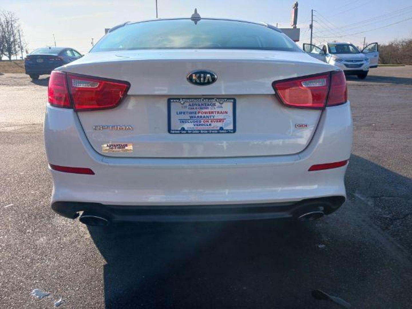 2014 Snow White Pearl Kia Optima LX (5XXGM4A75EG) with an 2.4L L4 DOHC 16V engine, 6-Speed Automatic transmission, located at 880 E. National Road, Vandalia, OH, 45377, (937) 908-9800, 39.892189, -84.181015 - Photo#5