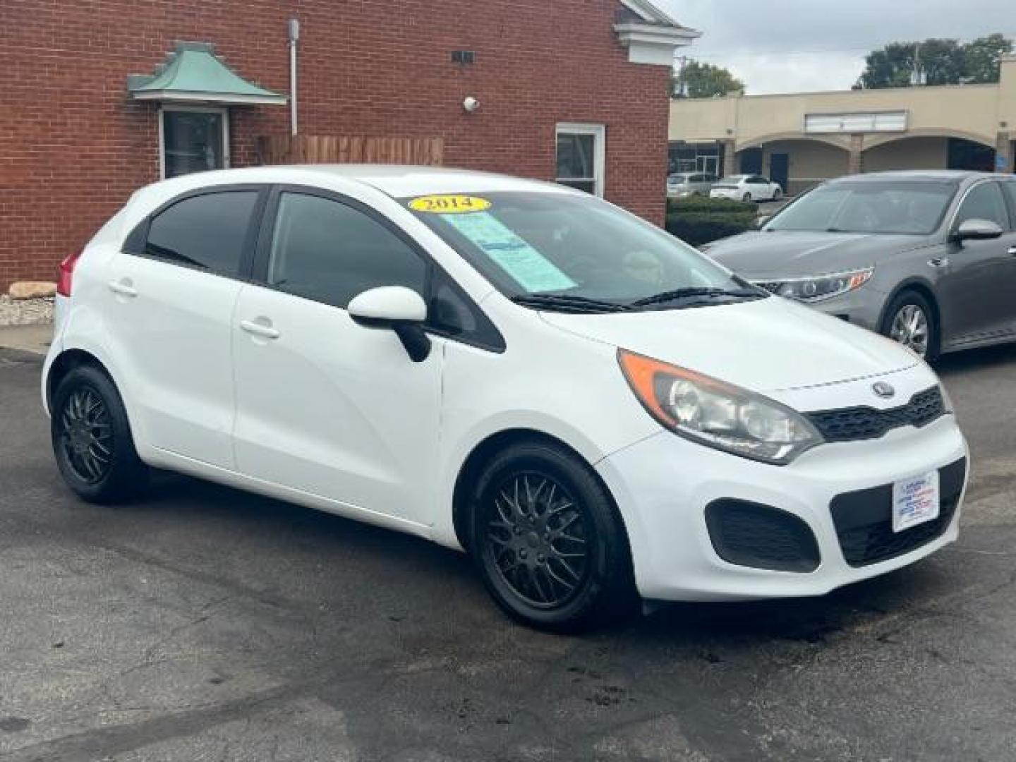 2014 Clear White Kia Rio5 LX (KNADM5A31E6) with an 1.6L L4 DOHC 16V engine, located at 4508 South Dixie Dr, Moraine, OH, 45439, (937) 908-9800, 39.690136, -84.216438 - Photo#0