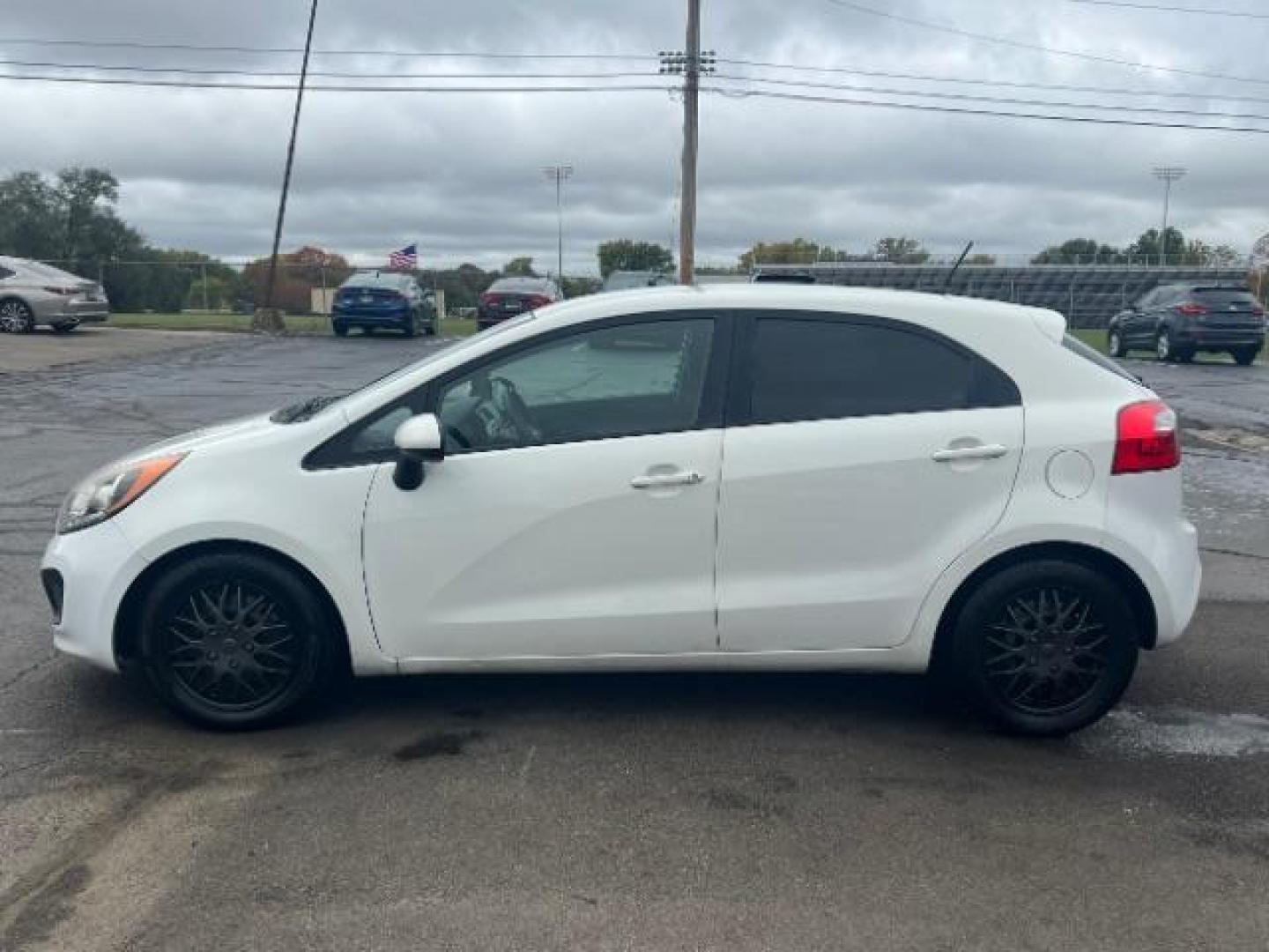 2014 Clear White Kia Rio5 LX (KNADM5A31E6) with an 1.6L L4 DOHC 16V engine, located at 4508 South Dixie Dr, Moraine, OH, 45439, (937) 908-9800, 39.690136, -84.216438 - Photo#3