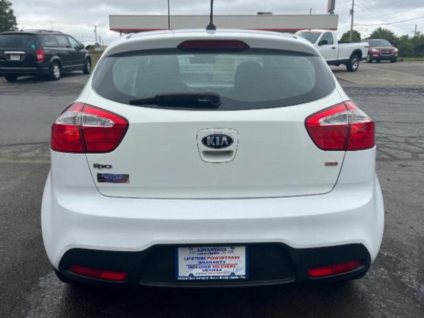 2014 Clear White Kia Rio5 LX (KNADM5A31E6) with an 1.6L L4 DOHC 16V engine, located at 4508 South Dixie Dr, Moraine, OH, 45439, (937) 908-9800, 39.690136, -84.216438 - Photo#4