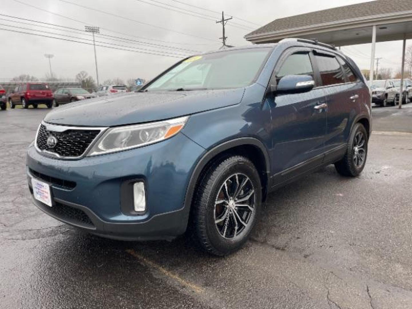 2014 Blue Kia Sorento LX 2WD (5XYKT3A64EG) with an 2.4L L4 DOHC 16V engine, 6-Speed Automatic transmission, located at 1184 Kauffman Ave, Fairborn, OH, 45324, (937) 908-9800, 39.807365, -84.029114 - Photo#1