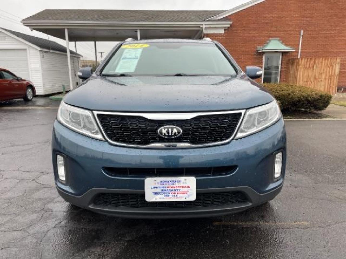 2014 Blue Kia Sorento LX 2WD (5XYKT3A64EG) with an 2.4L L4 DOHC 16V engine, 6-Speed Automatic transmission, located at 1184 Kauffman Ave, Fairborn, OH, 45324, (937) 908-9800, 39.807365, -84.029114 - Photo#4