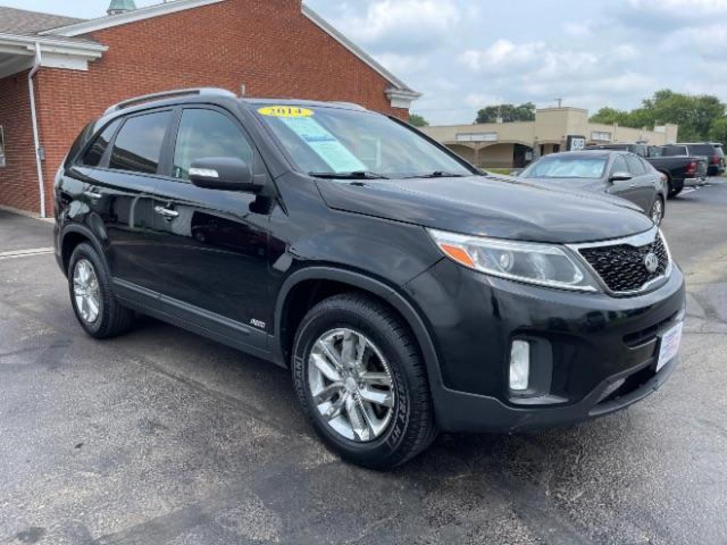 2014 Black Kia Sorento LX AWD (5XYKTCA68EG) with an 2.4L L4 DOHC 16V engine, 6-Speed Automatic transmission, located at 1099 N County Rd 25A, OH, 45373, (937) 908-9800, 40.057079, -84.212883 - Photo#0