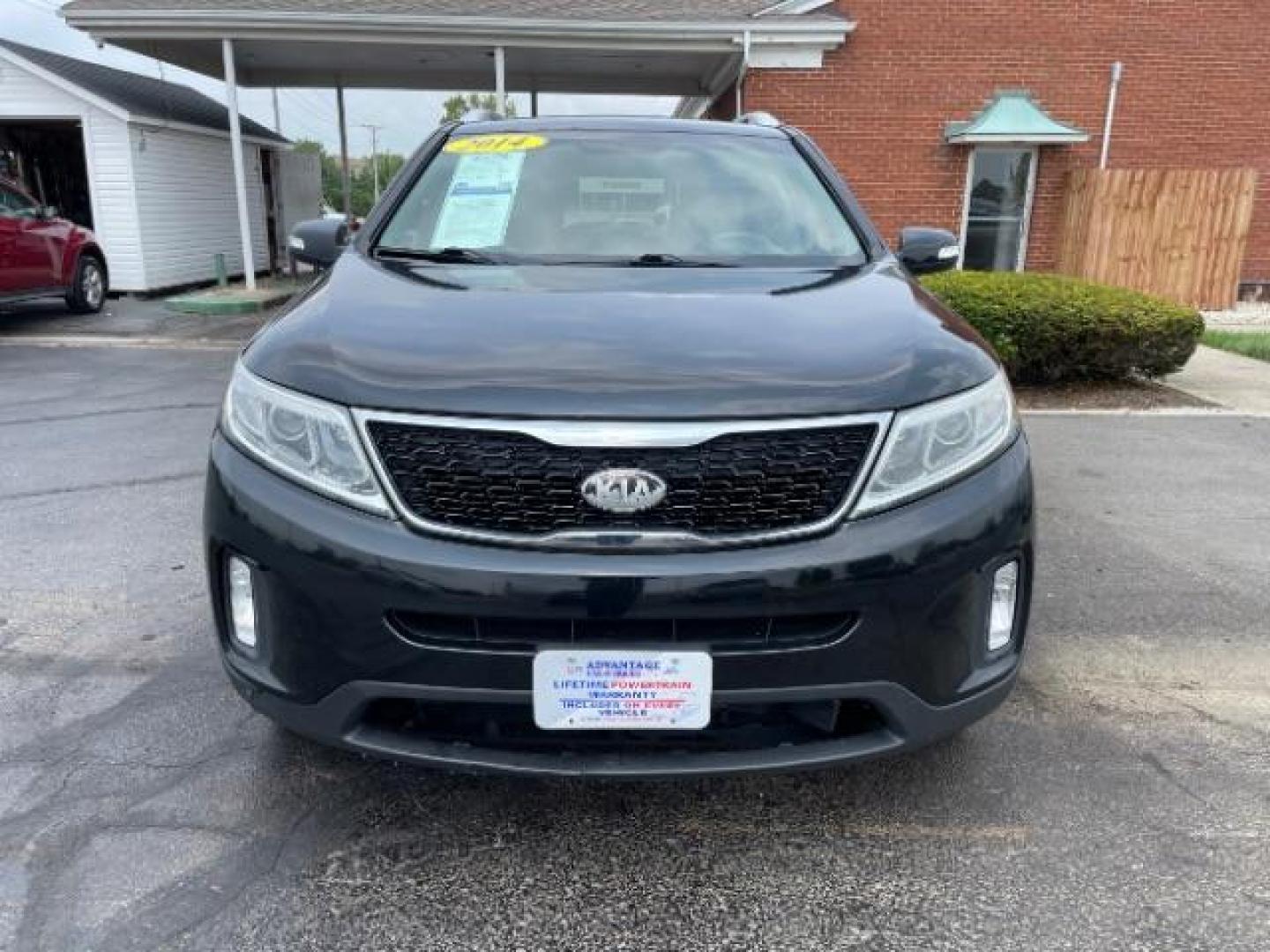 2014 Black Kia Sorento LX AWD (5XYKTCA68EG) with an 2.4L L4 DOHC 16V engine, 6-Speed Automatic transmission, located at 1099 N County Rd 25A, OH, 45373, (937) 908-9800, 40.057079, -84.212883 - Photo#1