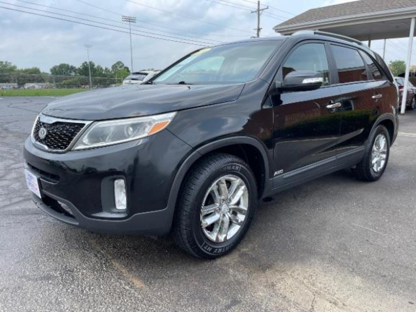 2014 Black Kia Sorento LX AWD (5XYKTCA68EG) with an 2.4L L4 DOHC 16V engine, 6-Speed Automatic transmission, located at 1099 N County Rd 25A, OH, 45373, (937) 908-9800, 40.057079, -84.212883 - Photo#2