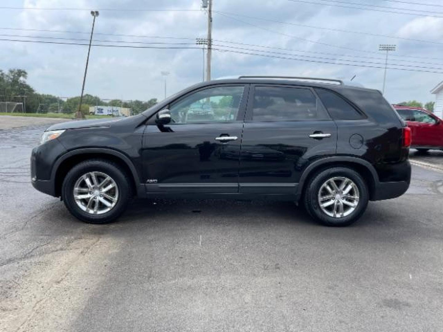 2014 Black Kia Sorento LX AWD (5XYKTCA68EG) with an 2.4L L4 DOHC 16V engine, 6-Speed Automatic transmission, located at 1099 N County Rd 25A, OH, 45373, (937) 908-9800, 40.057079, -84.212883 - Photo#3