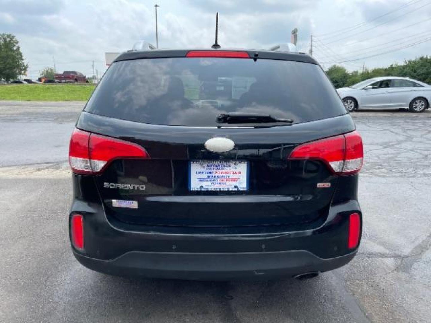 2014 Black Kia Sorento LX AWD (5XYKTCA68EG) with an 2.4L L4 DOHC 16V engine, 6-Speed Automatic transmission, located at 1099 N County Rd 25A, OH, 45373, (937) 908-9800, 40.057079, -84.212883 - Photo#4