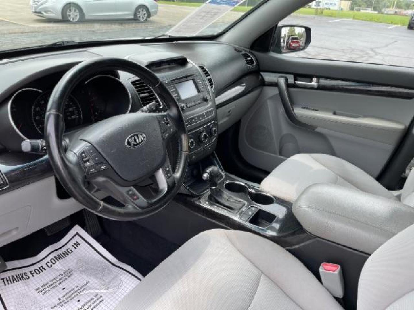 2014 Black Kia Sorento LX AWD (5XYKTCA68EG) with an 2.4L L4 DOHC 16V engine, 6-Speed Automatic transmission, located at 1099 N County Rd 25A, OH, 45373, (937) 908-9800, 40.057079, -84.212883 - Photo#6