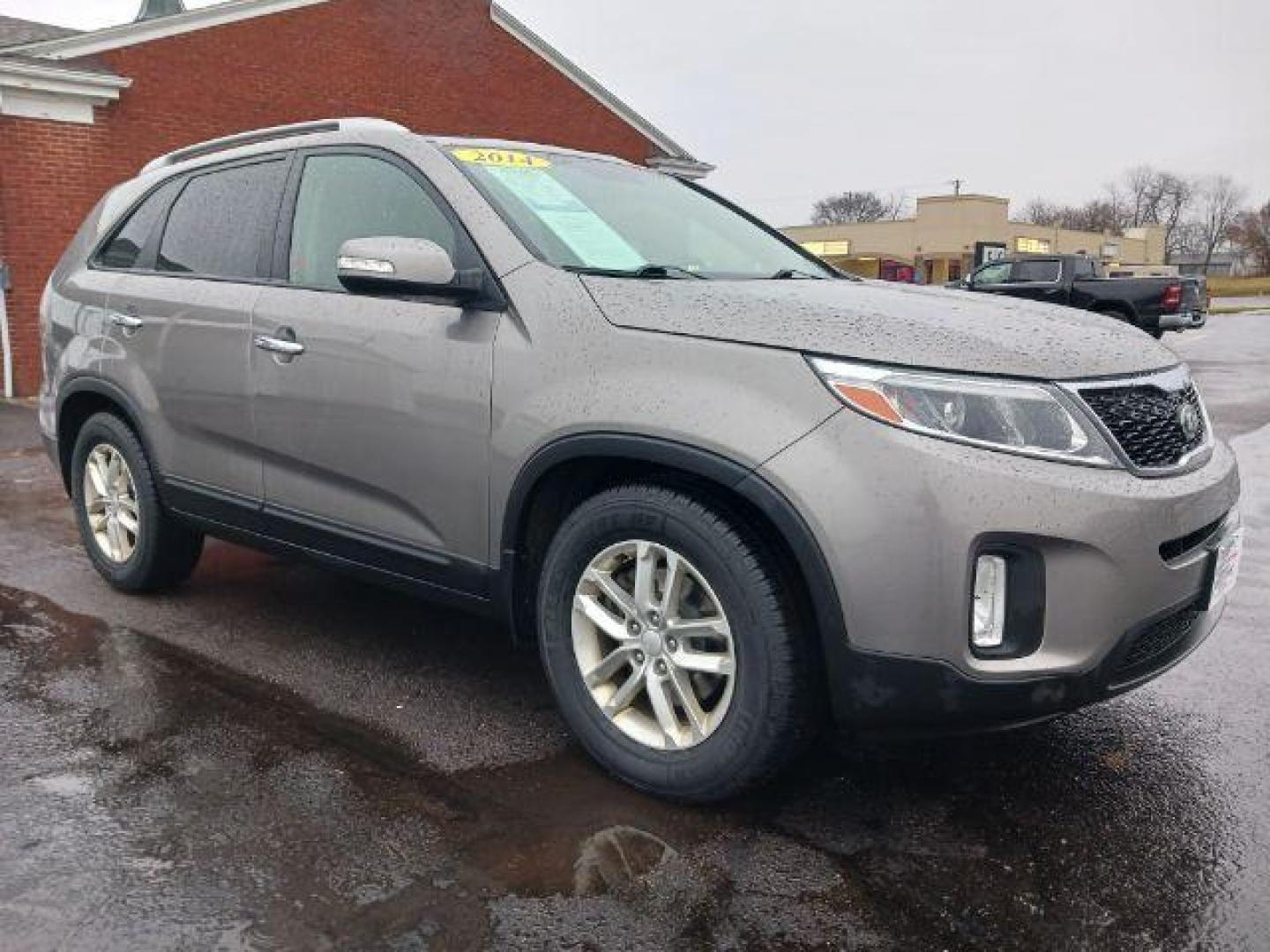 2014 Brown Kia Sorento LX 2WD (5XYKT4A61EG) with an 2.4L L4 DOHC 16V engine, 6-Speed Automatic transmission, located at 880 E. National Road, Vandalia, OH, 45377, (937) 908-9800, 39.892189, -84.181015 - Photo#0