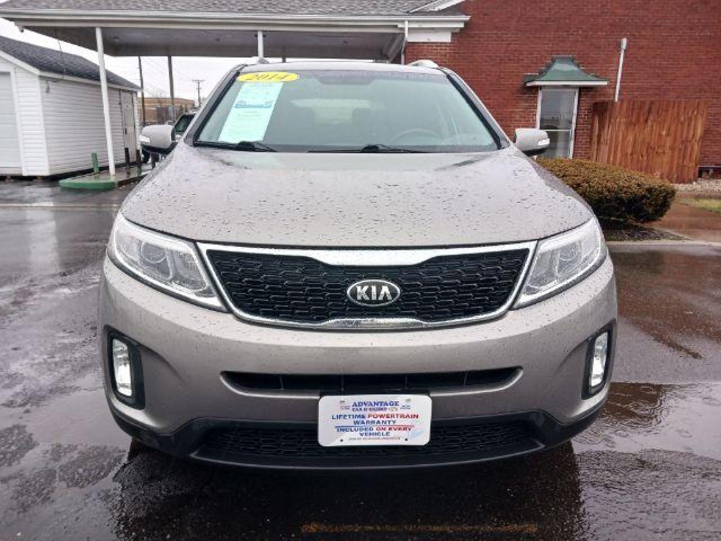 2014 Brown Kia Sorento LX 2WD (5XYKT4A61EG) with an 2.4L L4 DOHC 16V engine, 6-Speed Automatic transmission, located at 880 E. National Road, Vandalia, OH, 45377, (937) 908-9800, 39.892189, -84.181015 - Photo#1