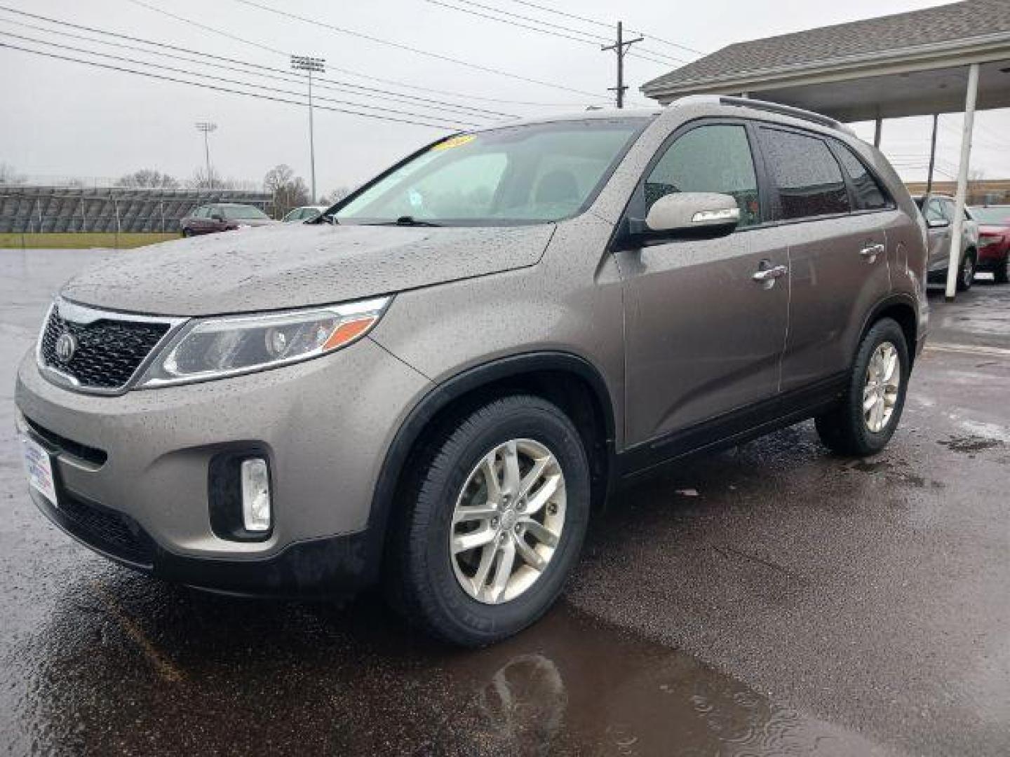 2014 Brown Kia Sorento LX 2WD (5XYKT4A61EG) with an 2.4L L4 DOHC 16V engine, 6-Speed Automatic transmission, located at 880 E. National Road, Vandalia, OH, 45377, (937) 908-9800, 39.892189, -84.181015 - Photo#2