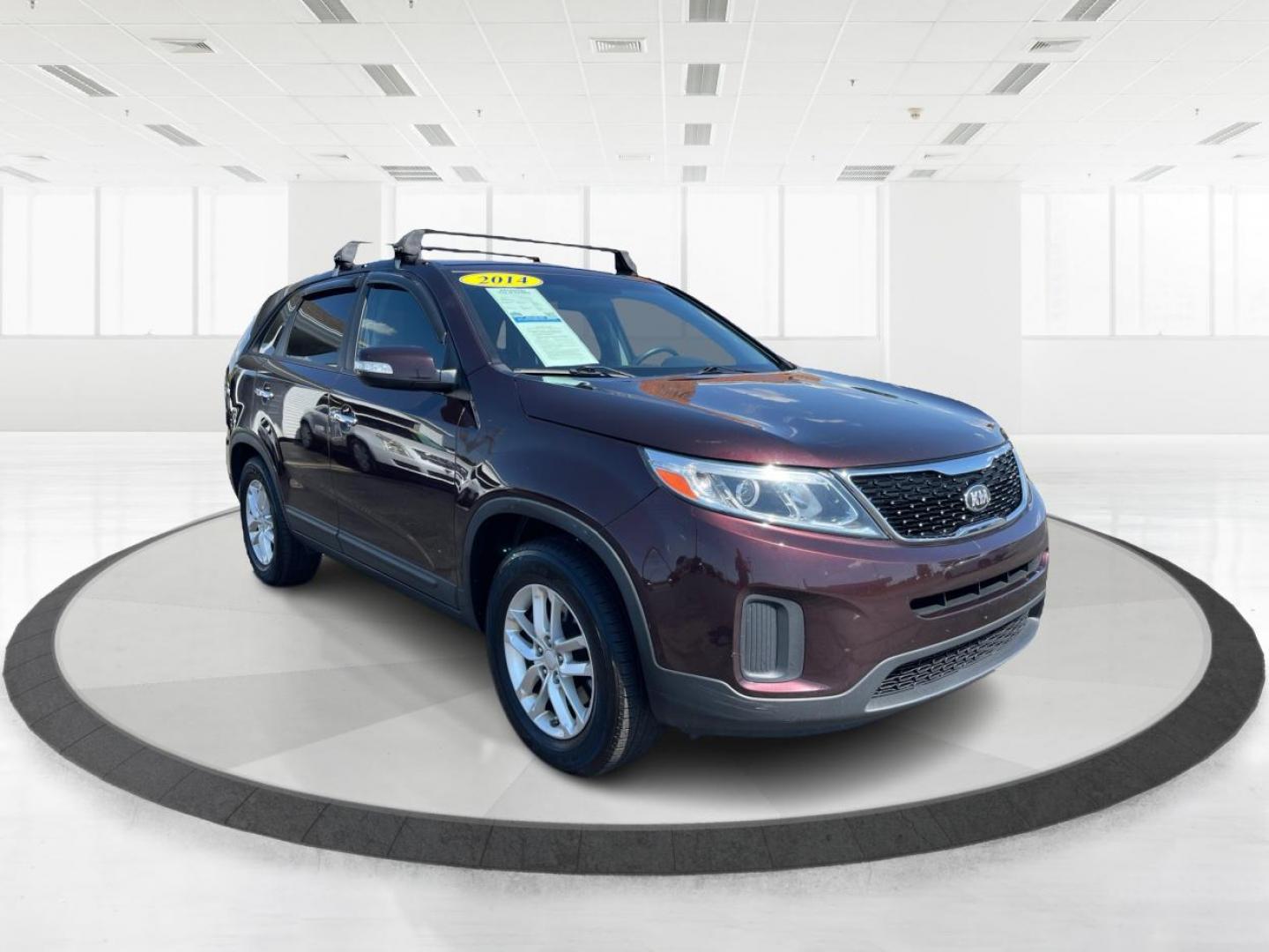 2014 Maroon Kia Sorento LX 2WD (5XYKT3A65EG) with an 2.4L L4 DOHC 16V engine, 6-Speed Automatic transmission, located at 880 E. National Road, Vandalia, OH, 45377, (937) 908-9800, 39.892189, -84.181015 - Photo#0