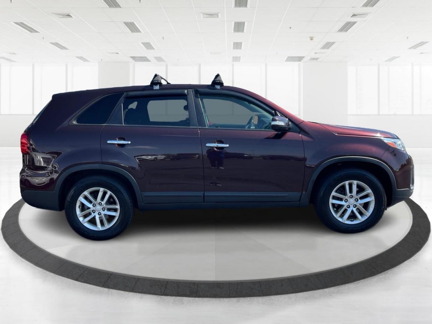 2014 Maroon Kia Sorento LX 2WD (5XYKT3A65EG) with an 2.4L L4 DOHC 16V engine, 6-Speed Automatic transmission, located at 880 E. National Road, Vandalia, OH, 45377, (937) 908-9800, 39.892189, -84.181015 - Photo#1