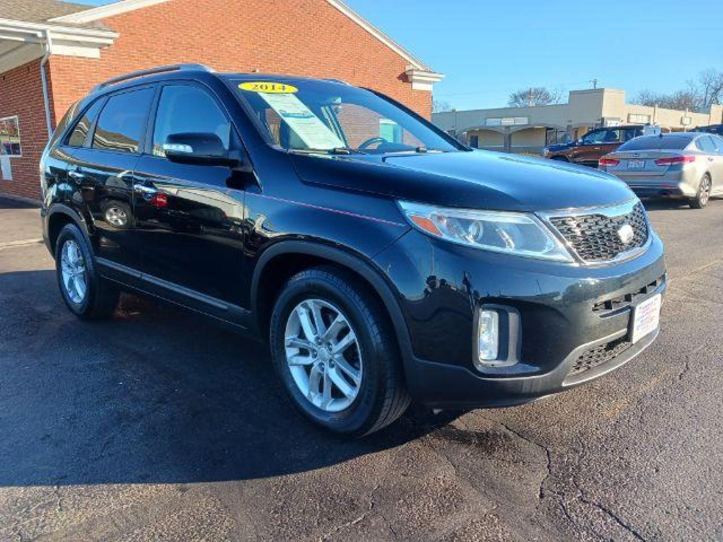 2014 Black Kia Sorento LX 2WD (5XYKT4A60EG) with an 2.4L L4 DOHC 16V engine, 6-Speed Automatic transmission, located at 1099 N County Rd 25A, OH, 45373, (937) 908-9800, 40.057079, -84.212883 - Photo#0