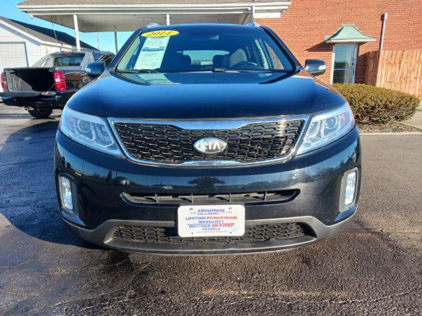 2014 Black Kia Sorento LX 2WD (5XYKT4A60EG) with an 2.4L L4 DOHC 16V engine, 6-Speed Automatic transmission, located at 1099 N County Rd 25A, OH, 45373, (937) 908-9800, 40.057079, -84.212883 - Photo#1