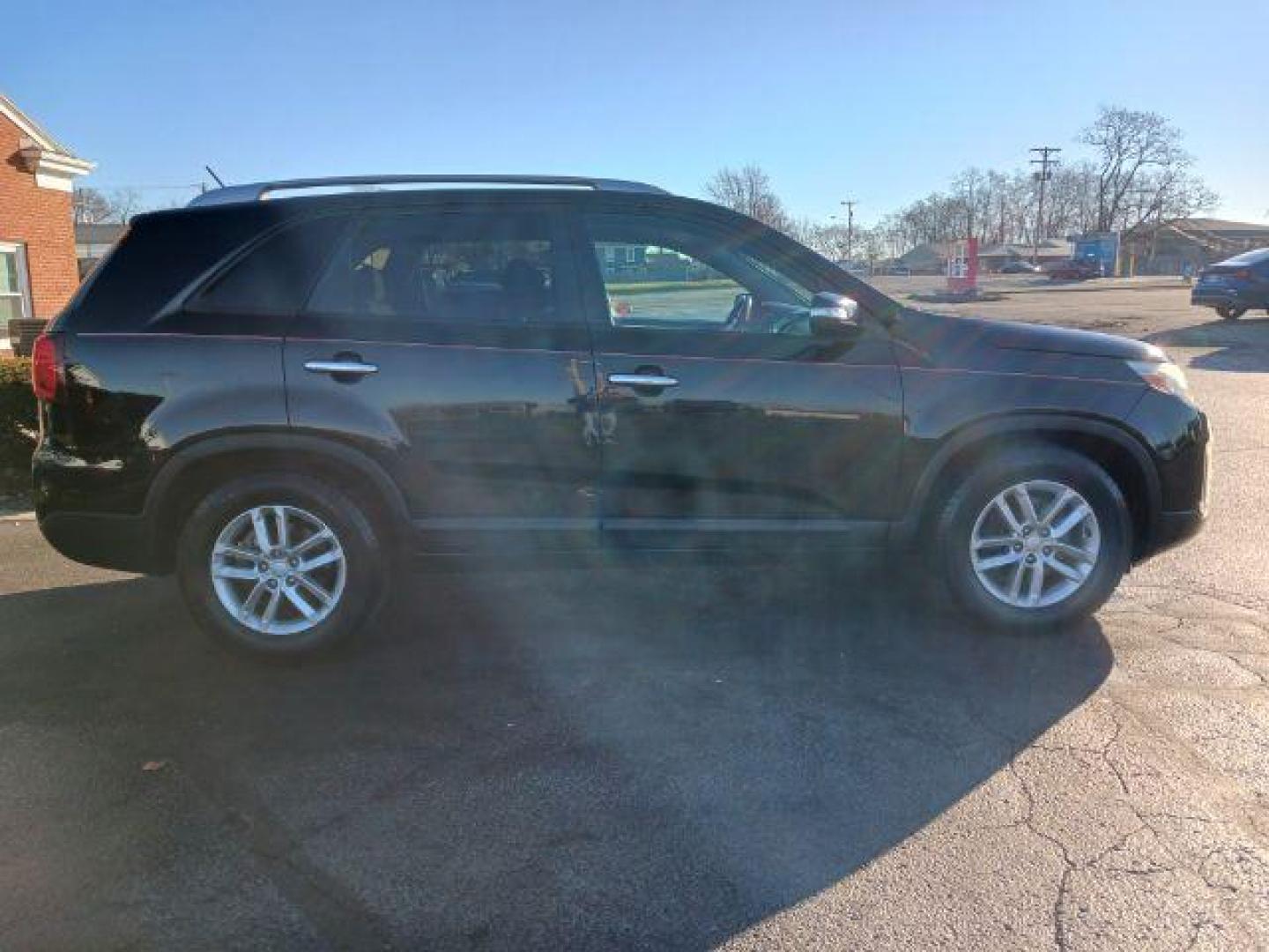 2014 Black Kia Sorento LX 2WD (5XYKT4A60EG) with an 2.4L L4 DOHC 16V engine, 6-Speed Automatic transmission, located at 1099 N County Rd 25A, OH, 45373, (937) 908-9800, 40.057079, -84.212883 - Photo#4