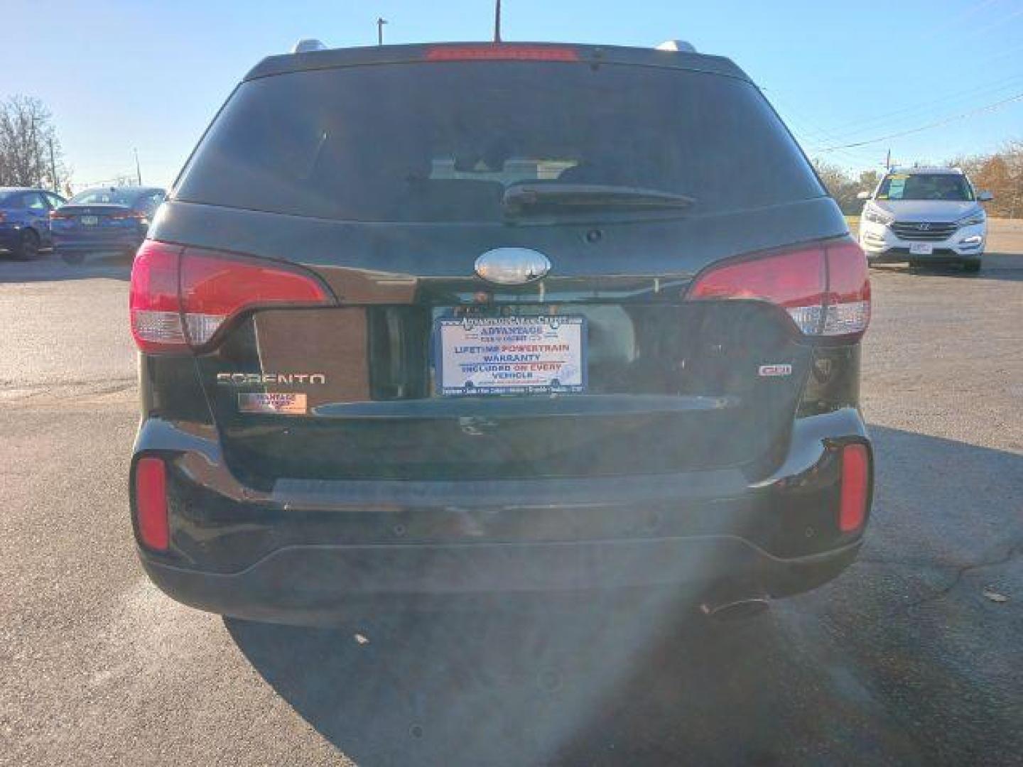 2014 Black Kia Sorento LX 2WD (5XYKT4A60EG) with an 2.4L L4 DOHC 16V engine, 6-Speed Automatic transmission, located at 1099 N County Rd 25A, OH, 45373, (937) 908-9800, 40.057079, -84.212883 - Photo#5